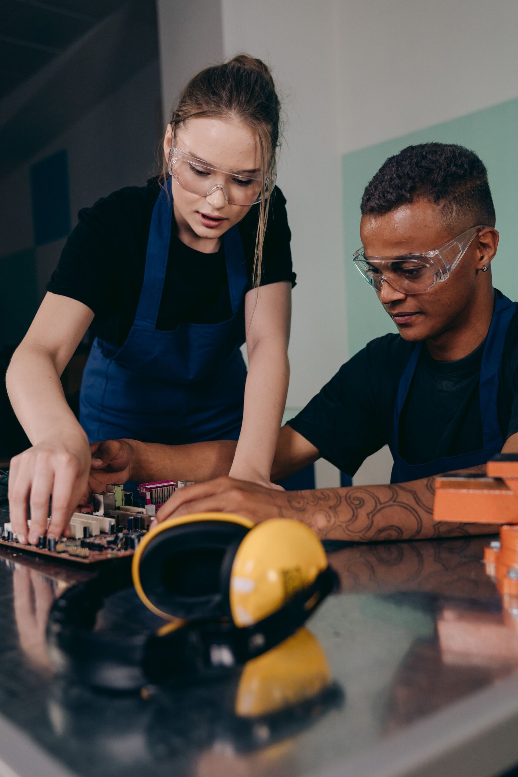Engineers collaborating on electronic product development in a laboratory